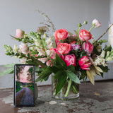 soft and bright pinks with greenery in vase